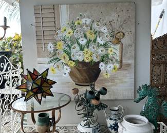 Daisy painting, Iron accent table, Slag glass star fixture, and more