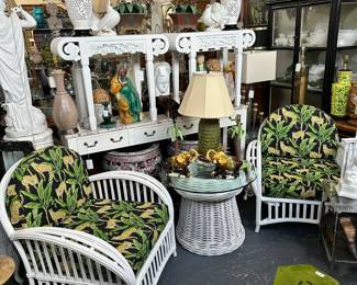 Pair of painted rattan armchairs, painted woven-reed mushroom side table, Pair of painted Chinese console tables, Pair of pierced Blanc-de-chine Chinese lamps, and more.