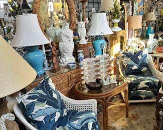 Pair of painted British Colonial style lounge chairs, Rattan oval end table, Italian pottery owls, and more.