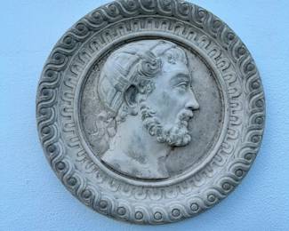 One of two concrete Neoclassical placques