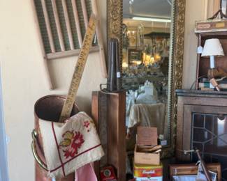 decorative mirror, brass coal scuttle, wash board