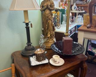 vintage wooden side table, lamps, large statue