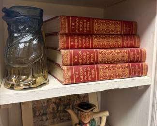 decorative book, tea pot, mug