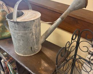 large vintage watering can