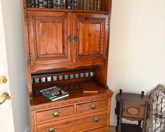 Wooden bookcase with drawers below gif storage