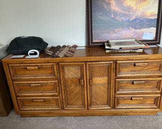 dresser and framed art