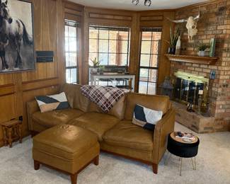 Rustic decor and furniture; caramel colored soft leather sofa in amazing condition (ottoman will be sold with matching arm chair)