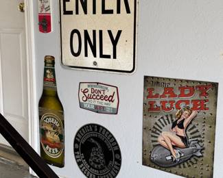 "Enter Only" traffic sign; Legends Lady Luck Vintage Pin up Art sign; America's Freedom Second Amendment sign; Vintage Moosehead Lager Tin Sign