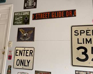 Collection of decorative metal signs