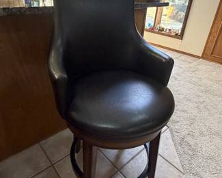 Counter height swivel bar stools, black leather with dark wood trim (6 Chairs total sold separately)