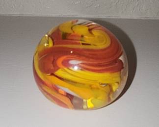 Hand-Blown Glass Paperweight with Red, Orange, and Yellow Swirls