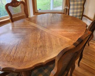 Vintage Thomasville Table and 5 Cane Back Dining Chairs.