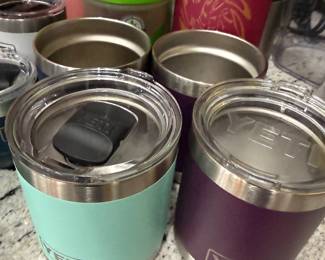 Many YETI travel bottles