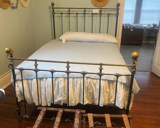 Queen size Antique Rod iron bed with mattress and box springs, antique luggage stands
