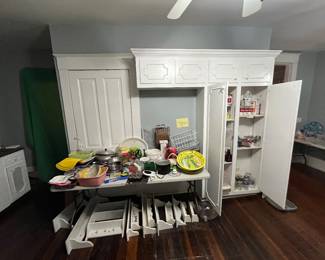 All different size wall shelves, pans, trays, dish drainers and so much more