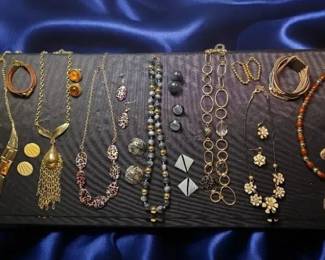 Gold BlackToned Necklaces, Earrings And Leather Bracelets