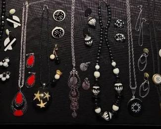 A Lovely Collection Of SilverTone, Black White, And Red Necklaces And Earrings