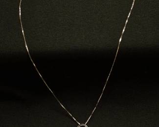 Pendant and chain (included) stamped .925 Pavé diamonds throughout the heart swirl. mix of white diamonds and black diamonds