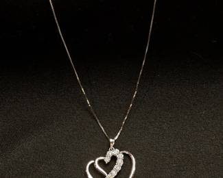 . 925 heart pendant with diamonds with included Midas 14K gold chain.