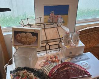 Tiffany style glass lampshade, crown accents cherub covered box, decorative hand fans, COMPAQ computer, Mikasa figurines, artwork “ a day at the beach “