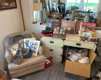 Mid-century, modern campaign style desk, office supplies, photo, albums, vinyl records, wicker baskets, wicker, laundry basket XL, beige loveseat, beautiful wall mirror, mirrors, floral art prints, linens