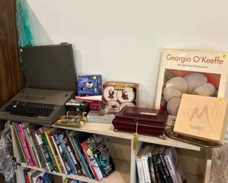 Brother AX – 20 electronic typewriter , whole punchers, Montefiore pen sets, salt and pepper shakers Christmas dish sets, beautiful picture frames, large coffee books, an American perspective by Georgia O’Keefe.