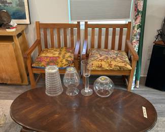 Teak wood armchairs, glass vases, Georgian Court style coffee table, floral fabric bolt, green fabric