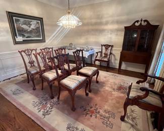 These eight chairs are available for pre-sale Sale contact Eva 704-605-6368 
Chippendale style dining chairs featuring a carved mahogany frame with a pierced splat back and traditional claw-and-ball feet.&nbsp;