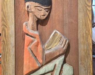Wood relief carving.