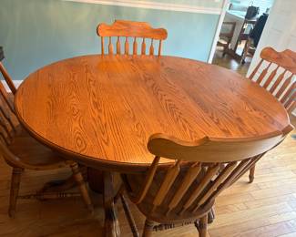 Solid Amish Table W/6 Chairs /Leaf & Pad 
$500
52”w X 32”h
