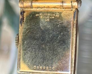 1950s Bulova pop-up photo case watch