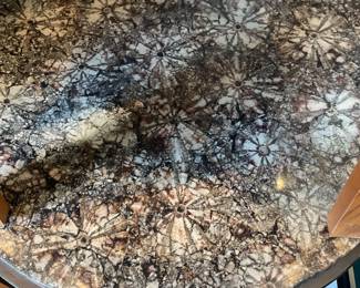 Side table with black metal spokes and stone patterned resin top (26” tall x 19” diameter) $50 + tax