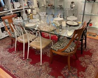 Glass top rectangular dining table with abstract chrome legs (30” x 71” x 39”) $625 + tax