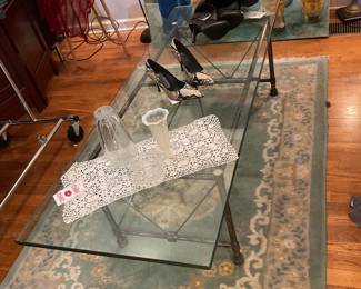 Glass top rectangular coffee table with steel legs (18” x 22” x 5’) $200 + tax