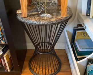 Side table with black metal spokes and stone patterned resin top (26” tall x 19” diameter) $50 + tax