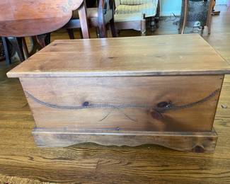 #24 Wood chest carved front with/brass handles and interior latch - as is finish 30x17x15" $ 40.00