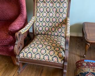 #17 Anitique carved wood rocking chair w floral upholstered button back -- $ 100.00