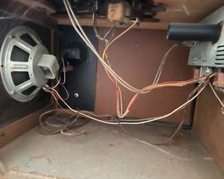 #13 Wooden stereo cabinet. Mid century Admiral stereophonic hi-fi console w record player. built in speakers. As is. Model: Y4071. Includes manual. Powers On. Speakers Untested 35.5x26x17.25" $ 165.00