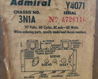 #13 Wooden stereo cabinet. Mid century Admiral stereophonic hi-fi console w record player. built in speakers. As is. Model: Y4071. Includes manual. Powers On. Speakers Untested 35.5x26x17.25" $ 165.00