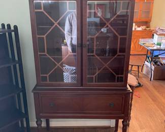 #4 Chippendale style display cabinet as is finish 1 drawer 2 shelves 2 glass front doors 37x73x16.5" $ 175.00