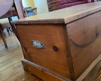 #24 Wood chest carved front with/brass handles and interior latch - as is finish 30x17x15" $ 40.00