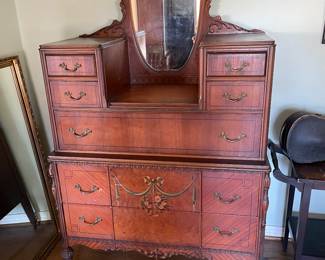 #9 Antique Victorian style bureau dresser on casters with mirror. 1 pc, 7 drawers. Wood carved details on casters. As is finish. You move 42x73.5x21" $ 325.00