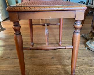#7 Side table w spindle legs. Cane top in good condition. Finish as is. 21x14x19.5 $ 25.00