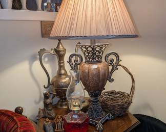 light, oil lamp, trinkets, tea pots