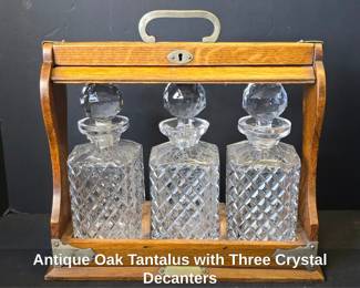Antique Oak Tantalus with Three Crystal Decanters