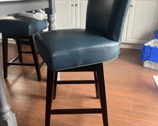 4 Leather counter height swivel chairs 