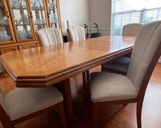 Wambold Oak Dining Table and Hutch Set with Upholstered Chairs