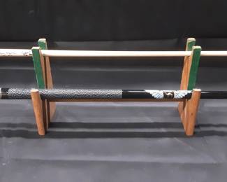 RARE AUTOGRAPHED STEVE MIZERAK CAMEL POOL CUE THIS RARE LOT FEATURES AUTOGRAPHS OF STEVE THE MIZ MIZERAK, MIKE CAPTAIN HOOK SIGEL, JEANETTE THE BLACK WIDOW LEE, EWA THE STRIKING VIKING LAURANCE