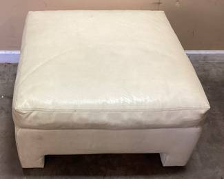 CREAM COLORED OTTOMAN