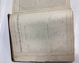 ANTIQUE 1892 HOLY BIBLE, SILVER PLATE PICTURE FRAME, AND 1880 MAN’S STRENGTH AND WOMAN’S BEAUTY HARD BACK BOOK